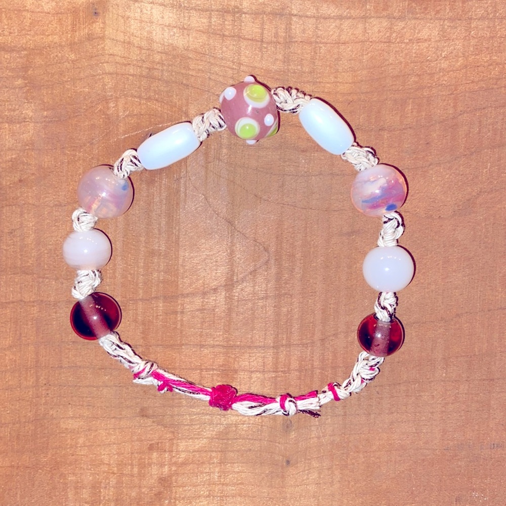 This bracelet is made with hemp has glass beads
